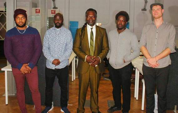 Jake, right, with other well-known speakers he has met when giving his talks about his life.