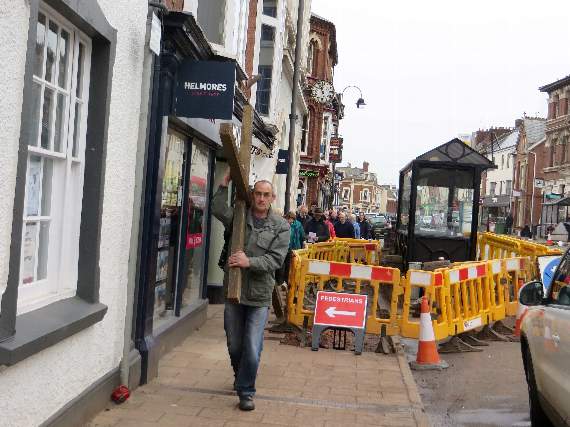 Negotiating the hole in the pavement by the Old Town Hall. SR 1941