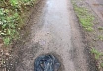 Old pair of jeans used to fill pothole near Crediton