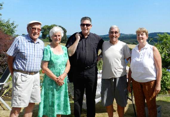 In the garden at Yeoland House, from left, hosts Brian and Mary Threlfall, Father Michael Wheaton of St Boniface Roman Catholic Church, Mayor of Crediton, Cllr Frank Letch and Mayoress Mrs Natalia Letch. NP 070718 01