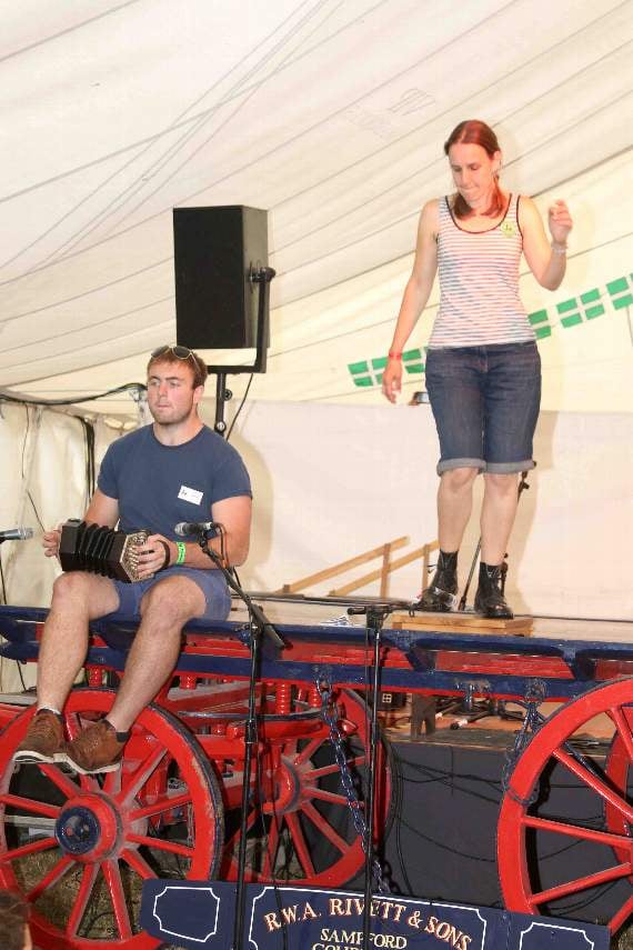 Jenny Read of Exeter won the adult Dartmoor Step Dance Championship, the music played by Thomas White, left. AQ 4669
