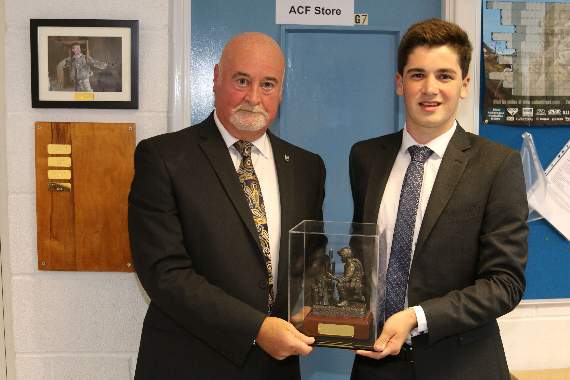 Tom Mann received the 2018 Jamie Fleming Award from Mr Stewart Fleming, left. AQ 4219
