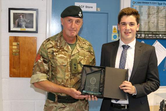 Lt Col Leigh Skelton, Commandant, Devon ACF, left, presenting the replica keepsake 2018 Jamie Fleming Award to Tom Mann. AQ 4222
