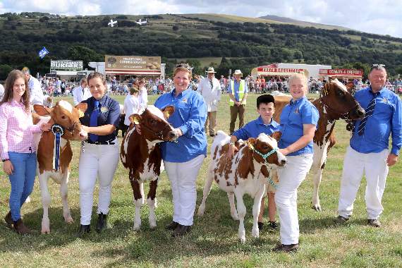 Some of the cattle exhibitors in the main ring after the Grand Parade. AQ 4390