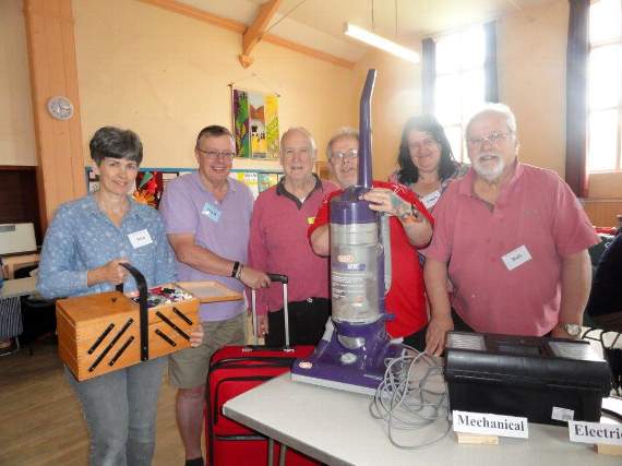 Pictured at the Repair Cafe is Crediton Methodist Church minister, the Rev Ann Varker, Steve Savage-Jones, who successfully repaired a vacuum cleaner, Ian Barnard, organiser, Paul Stockard a customer, Bob Moore electrical mechanic and Linda Savage-Jones, secretary. Photos: Margaret Tucker