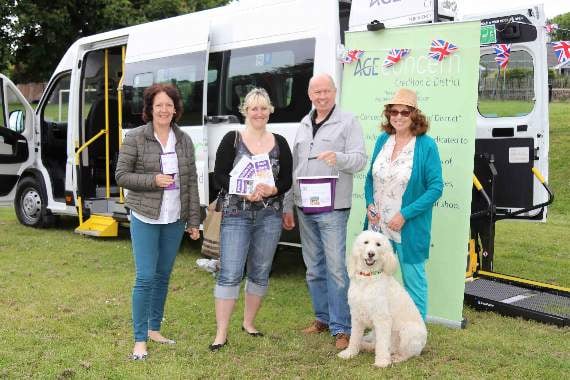 Age Concern Crediton took along their new bus and their therapy dog, ‘DD’. AQ 1657