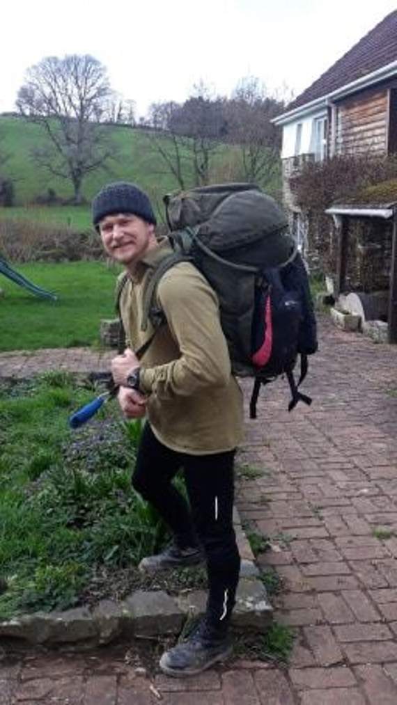 Tom Wheldal before he set off on his 44-miles march and wearing his 50lb backpack.