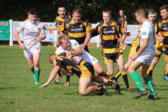 A Newton Abbot player put a stop to a Crediton ‘Quins player. AQ 6036