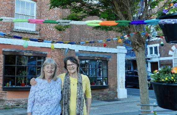 Sandra Hookway and Lois Hamilton helped to decorate Crediton Town Square during the yarn bombing. NP 310519 04