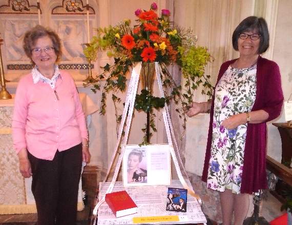 Jenny Cave and Lesley Rogers with their depiction of ‘Song Without End’ on behalf of Cheriton Fitzpaine Methodist Church (which was ‘born in song’). Photos: David Nunn