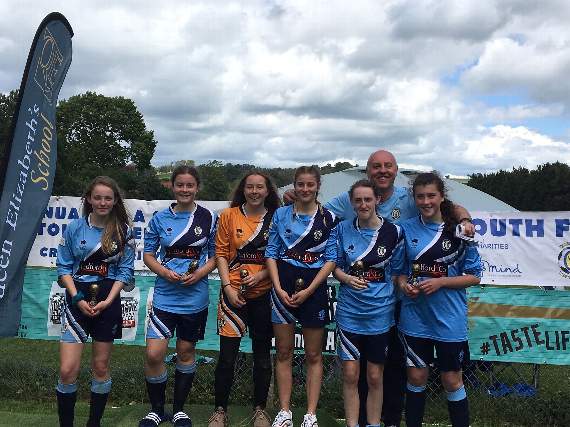 Crediton Youth Under 16’s Girls A team who were runners-up, with coach Dave Hartshorne.