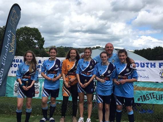 Crediton Youth Under 16’s Girls A team who were runners-up, with coach Dave Hartshorne.