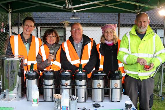 Helpers on the drinks stall at the Screen on the Green film show event. AQ 1854