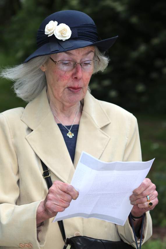 Boniface Link Association secretary Judy Tucker reading during the Saint’s Feast Day ceremony. AQ 1672