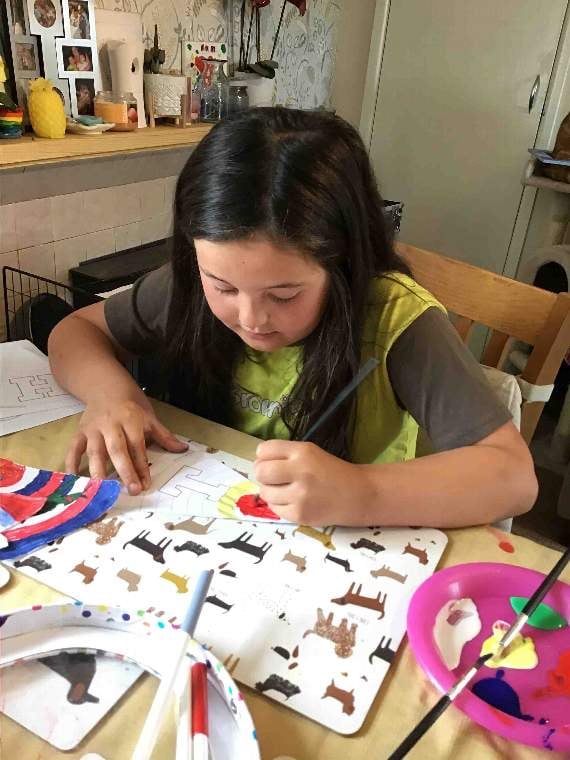 Izzy making bunting.