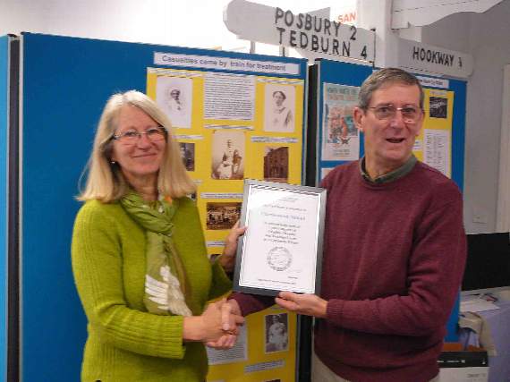 John Heal presented Chris Nicholl of Charlesworth Nicholl with an award.