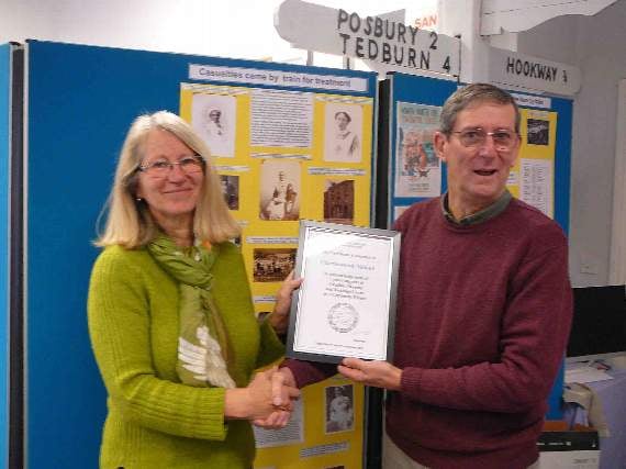 John Heal presented Chris Nicholl of Charlesworth Nicholl with an award.