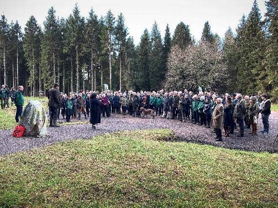 A good crowd attended to watch the unveiling of the plaque at Eggesford Forest.