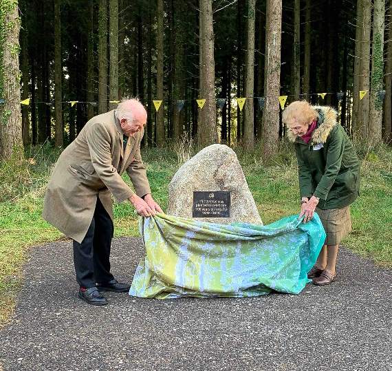Lord and Lady Clinton unveiling the plaque at Eggesford Forest.
