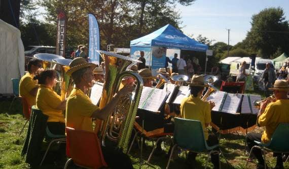 In their summer boaters, Crediton Town Band had people smiling at their happy tunes. SR 2273