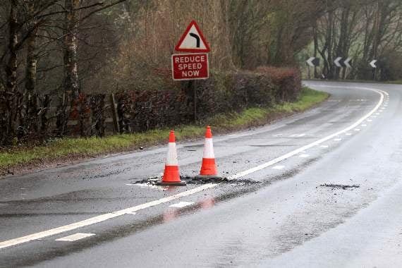 A manhole collapsed near Spencecombe Bends on the A377 and was quickly repaired. AQ 6723