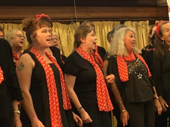 Singers on stage during the concert.