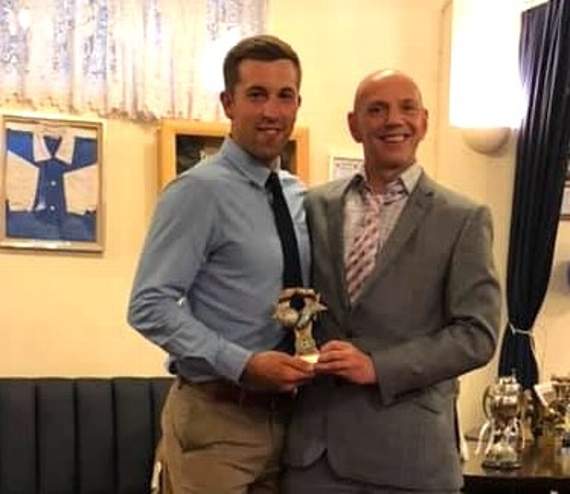 Dave Lee, left, First Team Supporters’ Player of the Year is presented with the cup by Chairman Martin Edgington.