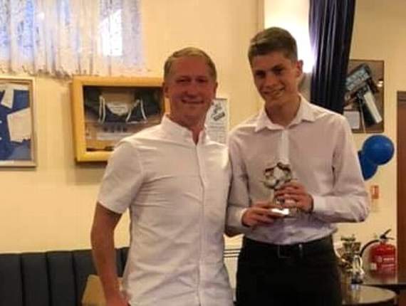 First Team Most Improved Player of the Year James Close with the assistant manager Richard Blake.