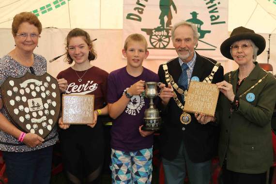 Shirley Bazeley, festival president, left presents the Dartmoor Step Dance Champion, Alice Knight, with her trophy while the Mayor of West Devon, Cllr Tony Leech and Mayoress, Mrs Sue Leech, right, present the junior award to Edward Selwood.