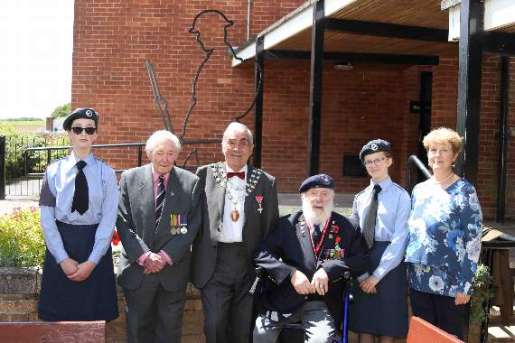 After the unveiling of the statue at Queen Elizabeth’s School, from left, Cadet Megan Bloomfield, John Higgs, Cllr Frank Letch, the Mayor of Crediton, D-Day veteran Bob Reeves, his great-granddaughter Alisha Baker and Mayoress, Mrs Natalia Letch. AQ 1699