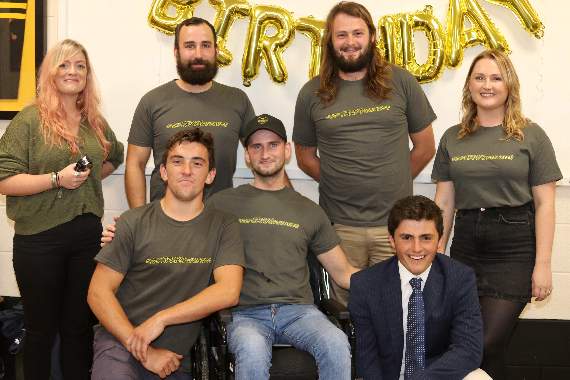 Before the headshaves and trims, from left, hairdresser Louise Browne, Alex Dennis, Sam Bullingham and Chloe Dennis and front, from left, Matt Baker, Craig Dennis and Guy Hamer who completed the charity walk. AQ 4269