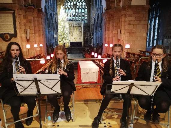 Rehearsing for the Carol Service at Crediton Parish Church.