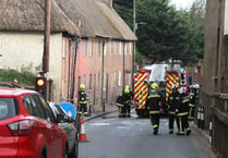 Passing motorist praised for averting serious thatched roof fire in Crediton cottages
