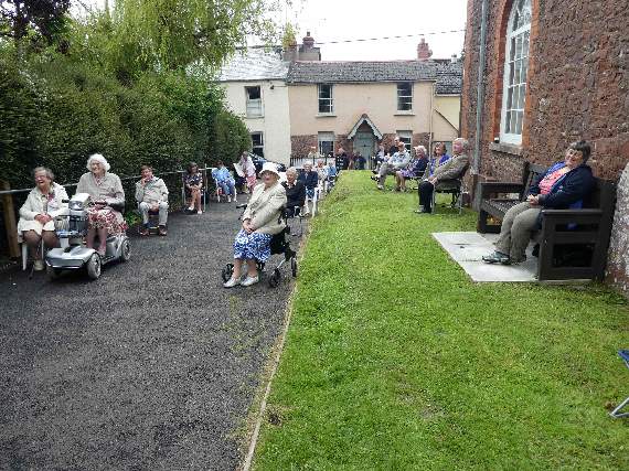 The congregation in the car park at Cheriton Fitzpaine Methodist Church.