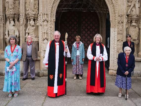 The Bishop of Exeter, Bishop Robert and The Bishop of Crediton, the Rt Rev Jackie Searle, with some of the award recipients after the ceremony.