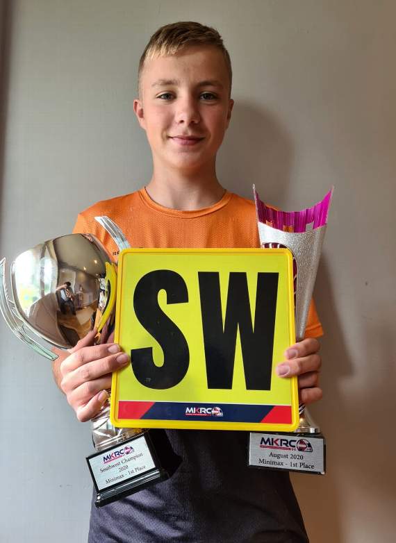 Billy with his trophies after winning the South West Karting Championships.