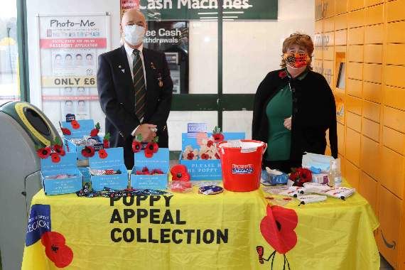 Collecting donations for the Royal British Legion Poppy Appeal in the foyer at Crediton's Morrisons store. AQ 9621