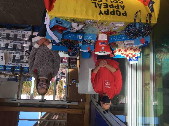Andrew Drayton, Tesco Champion and Jane Sansom, Crediton Poppy Appeal Organiser after they set up the table.