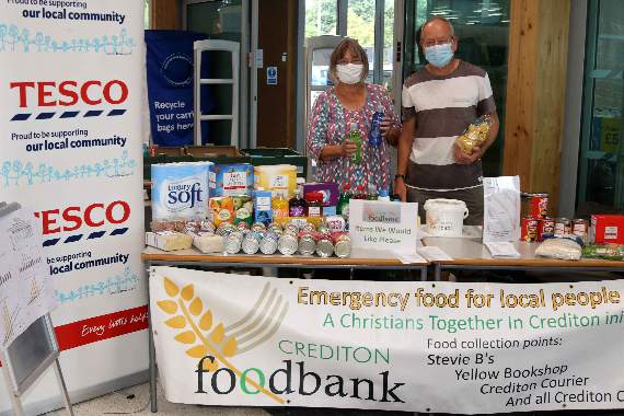 Foodbank volunteers Eileen and David Brassington at Crediton’s Tesco store. AQ 9128