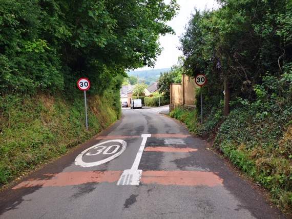 Worn road signs at Sandford.