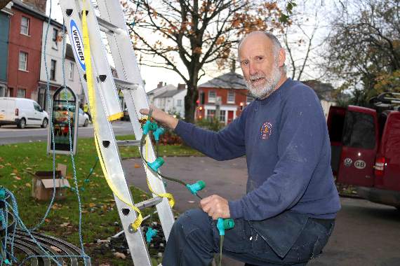 Jo Ward has begun putting up the Christmas lights at The Green. AQ 9688