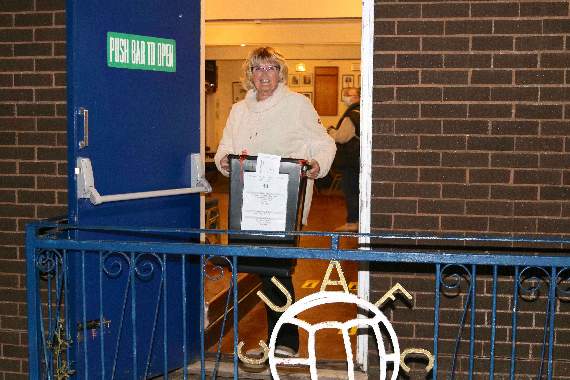 Leaving Crediton Football Club with one of the ballot boxes.