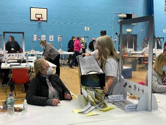 One of the ballot boxes being tipped out at Lords Meadow Leisure Centre.