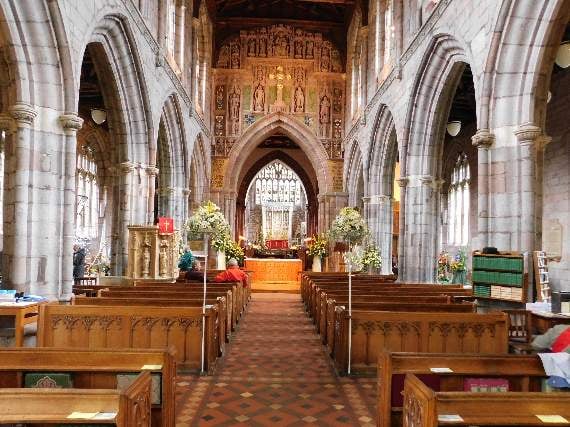 The entire western side of the chancel arch inside Crediton Parish Church forms an elaborate monument to Sir Redvers.
