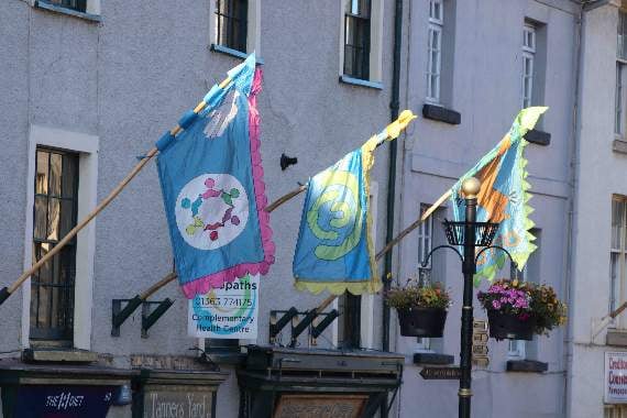 Some of the flags in Crediton High Street. AQ 8420