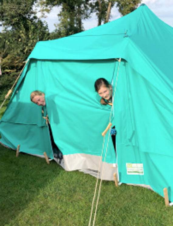 Two 1st Bow Scouts with some of the new camping equipment.