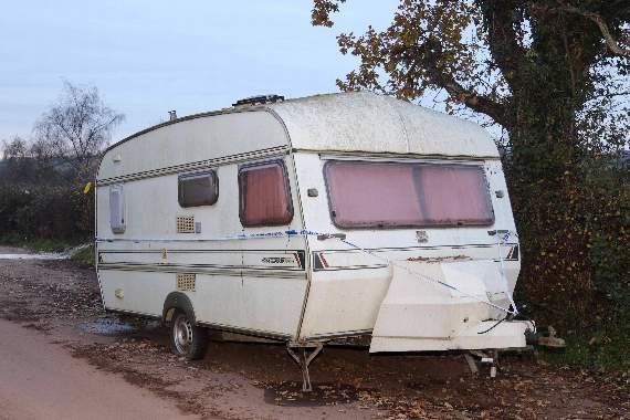 The caravan dumped in a lay-by near Hookway, Crediton. AQ 9798