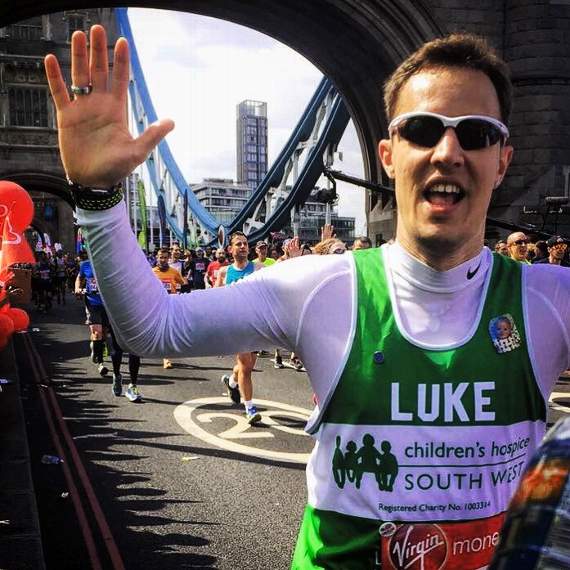 Luke Compton pictured crossing Tower Bridge in the 2017 London Marathon.