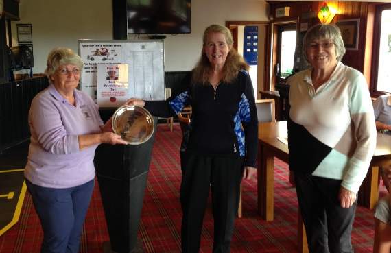 From left, Okehampton Golf Club Ladies President Maureen Willcocks presenting the President's Day salver to the winner, Cherry James, looking on Lady Captain Sylvie Gowers.