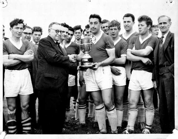 Bill Ellaway of Crediton United receiving the Devon and Exeter League Senior One Champions Trophy in 1962.